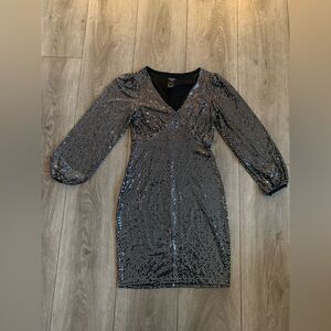 Alexa B nites woman’s dress perfect for date night. NWOT